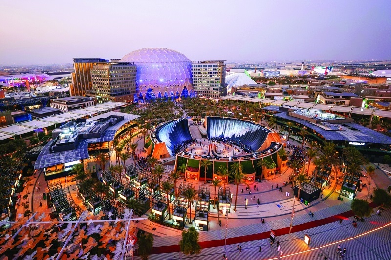 view from elevator of expop 2020 dusk time where you can see lights people and all structure , and architechural desgin , photos by Zeeshan Ahmed